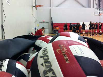 A pile of volleyballs await the NIU Huskies